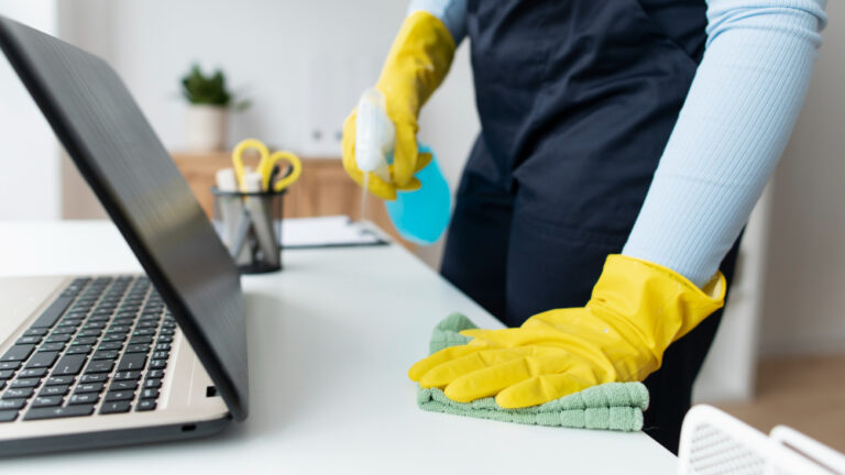 person-taking-care-office-cleaning